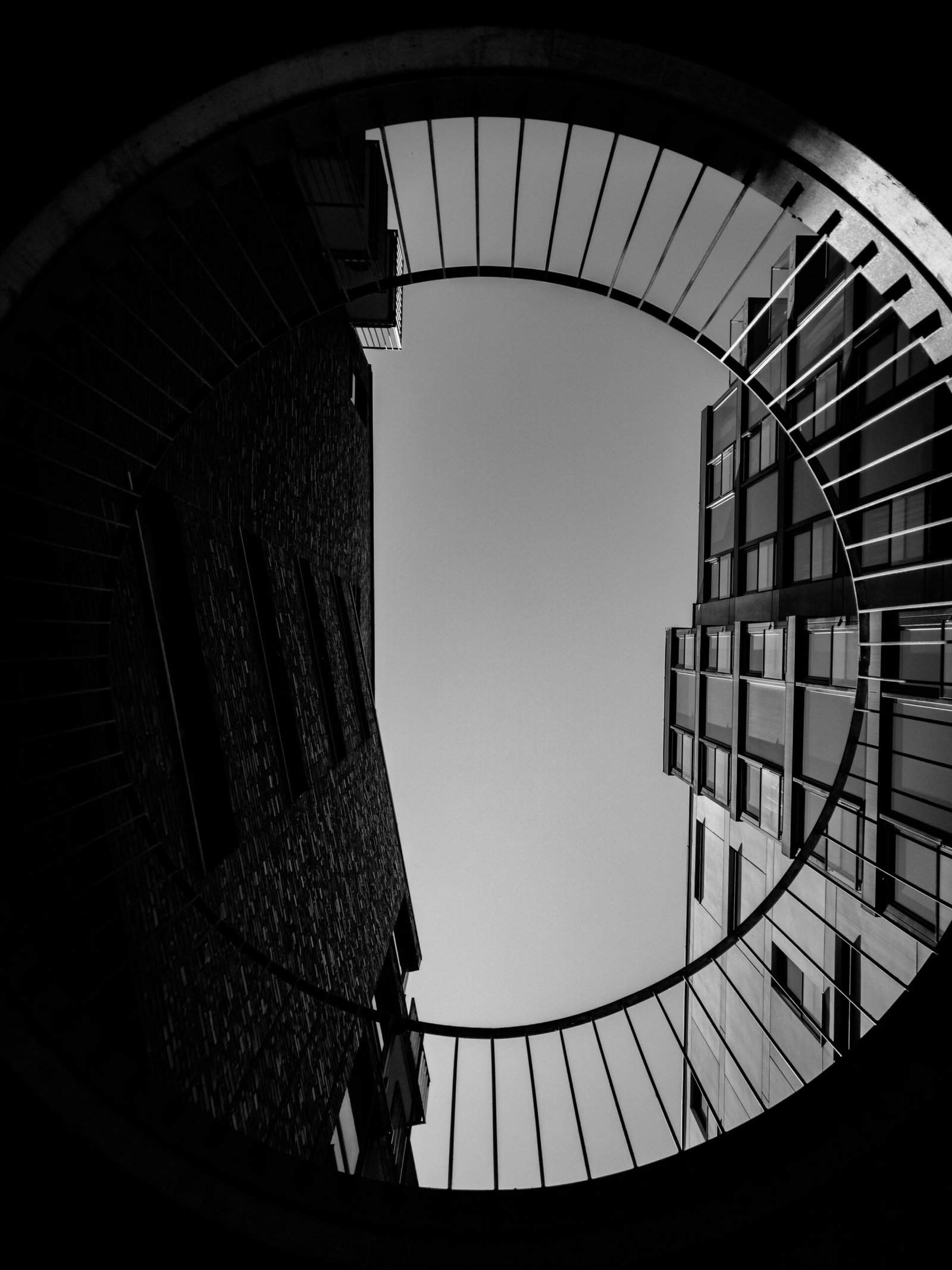 grayscale photography of building low-angle photography